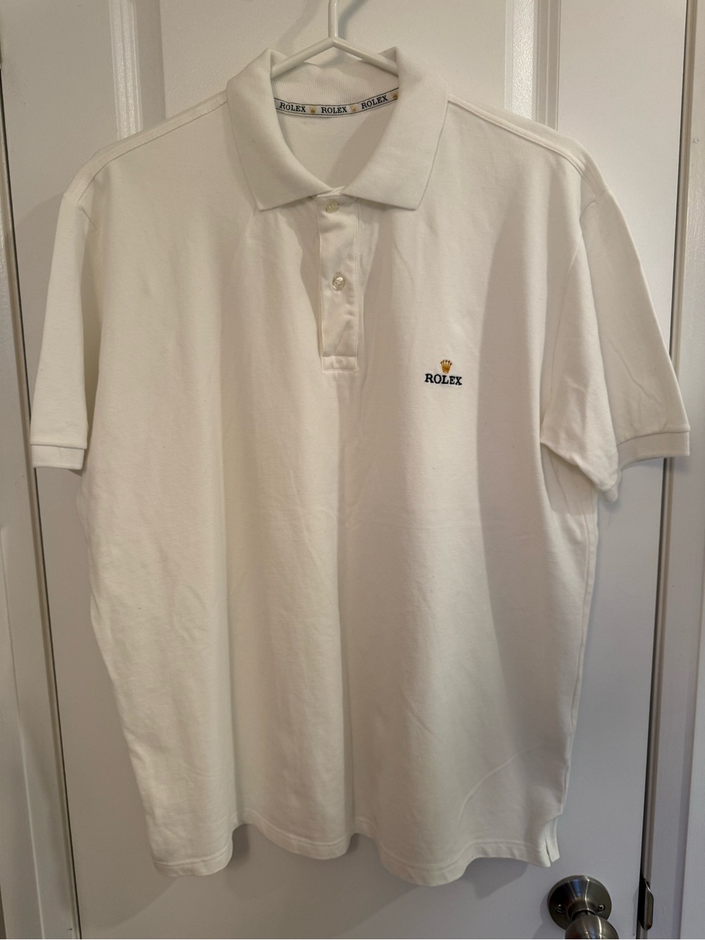 Rolex White Polo Shirt with Gold Crown Emblem